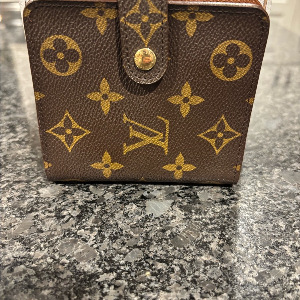 Louis Vuitton Monogram Canvas Wallet.